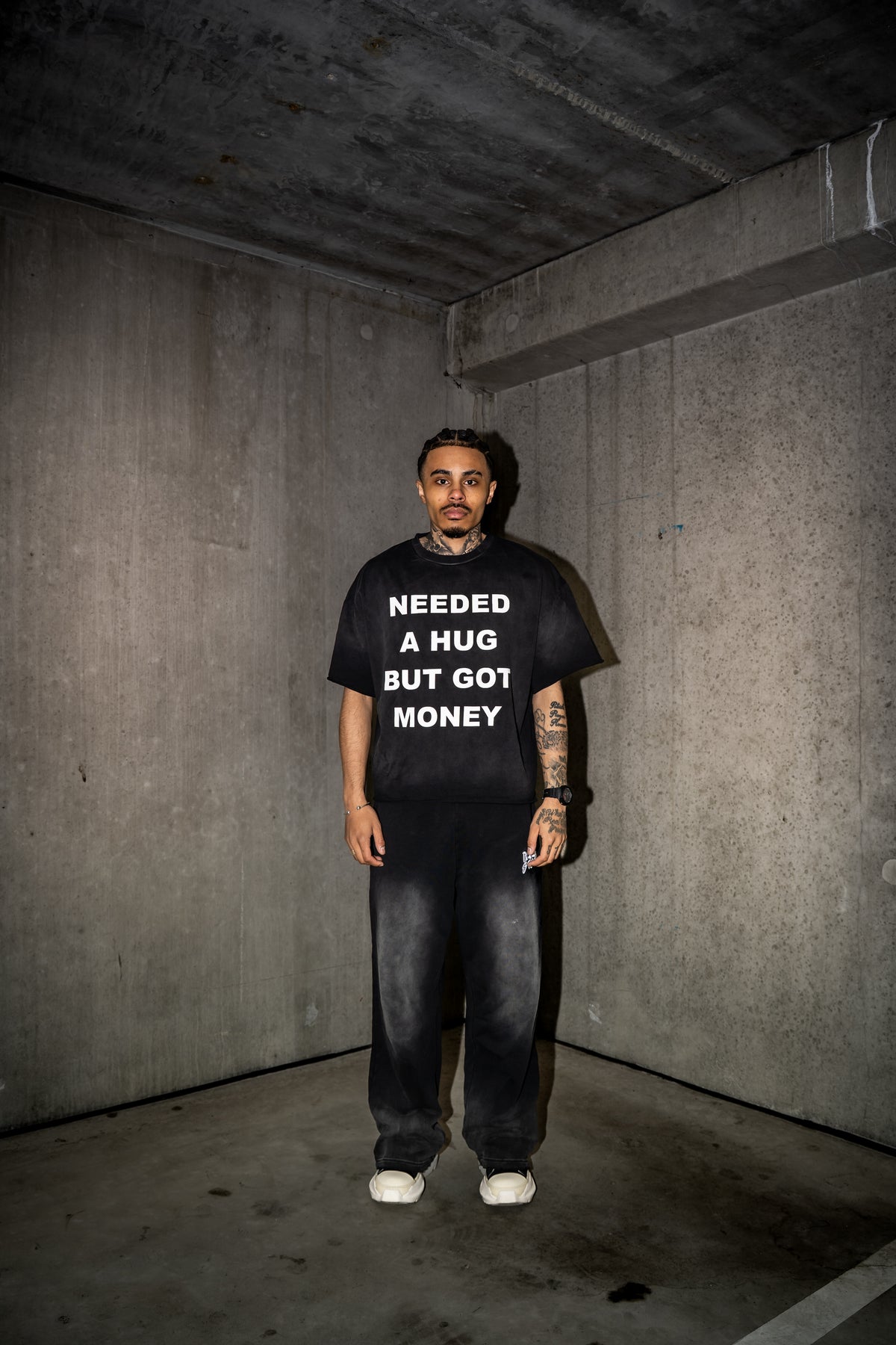 Model wearing the BYND STUDIOS Needed A Hug tee with wide jeans